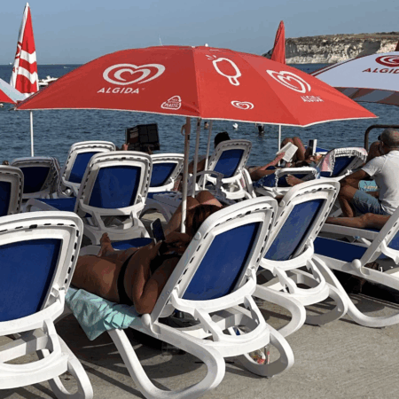 Two Sunbeds & Umbrellas